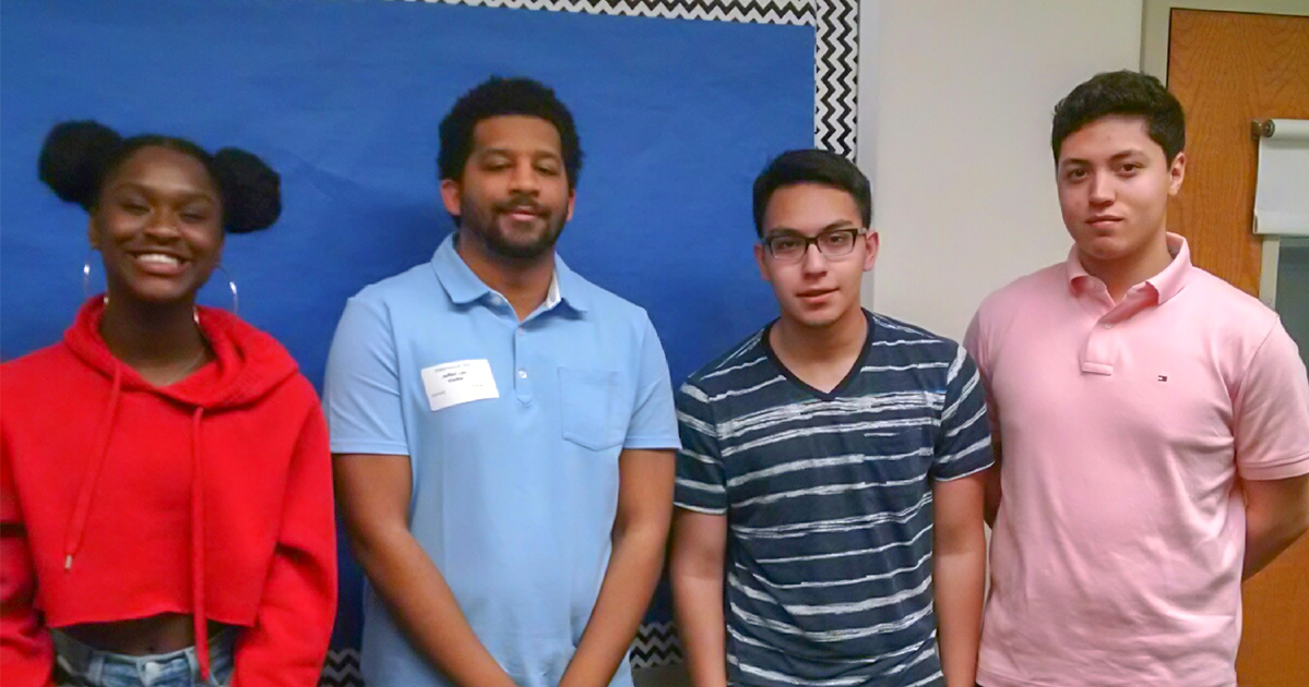 Jefferi Lee (Blue shirt), guest speaks from OBCC speaks to students (Alina, Danys & Oscar) about college life and time management.
